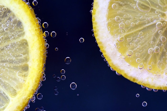 Slices of lemon with bubbles on them shot with macro photography