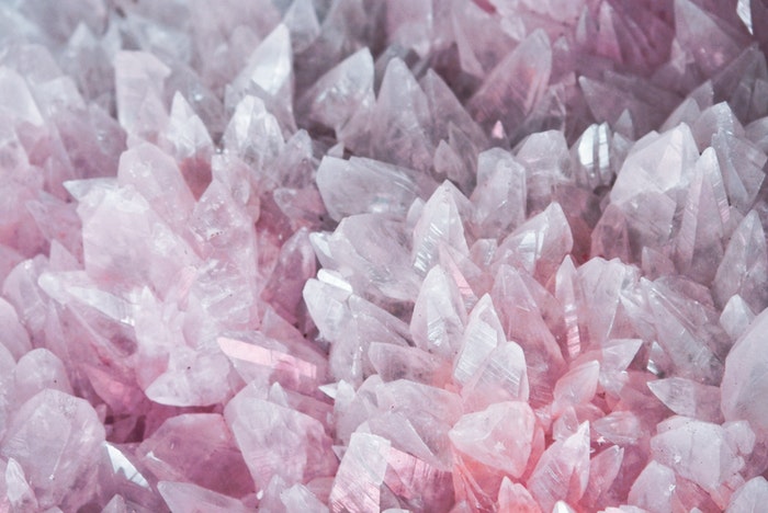 A macro photography shot of pink crystals