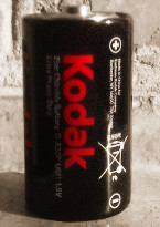 Выделенная красная надпись Kodak на фоне сепии